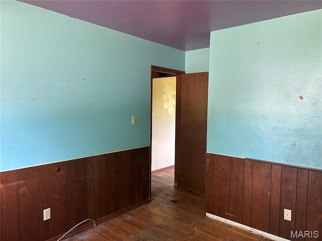 11214 Terry Ave, Bridgeton, MO 63044 - empty room featuring wainscoting, wood finished floors, and wood walls