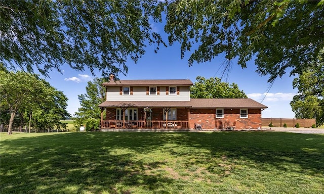 2038 County Highway 333, Benton, MO 63736 - view of front of house with a chimney and a front lawn