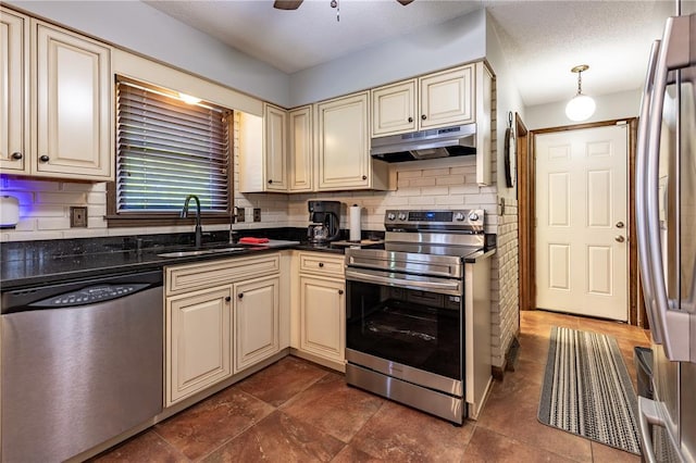 2038 County Highway 333, Benton, MO 63736 - kitchen featuring cream cabinets, stainless steel appliances, and under cabinet range hood