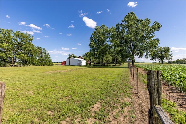 2038 County Highway 333, Benton, MO 63736 - view of yard featuring a rural view, a pole building, an outdoor structure, and agricultural plots