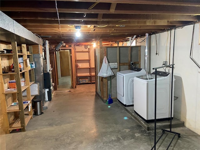 1018 S Spring St, Palmyra, MO 63461 - unfinished below grade area featuring independent washer and dryer and heating unit
