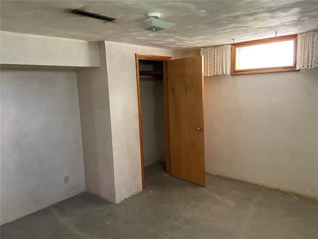 1018 S Spring St, Palmyra, MO 63461 - unfurnished bedroom featuring concrete flooring