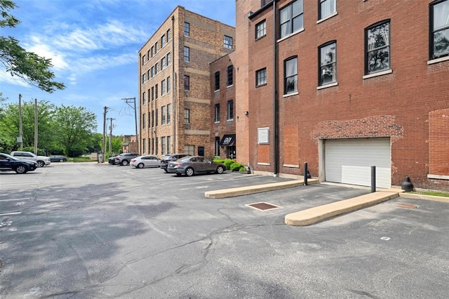 1720 Chouteau Ave Unit 110, Saint Louis, MO 63103 - view of building exterior with uncovered parking