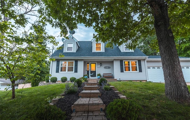 1104 Turkey Run, Rolla, MO 65401 - new england style home featuring a front yard, a garage, and roof with shingles