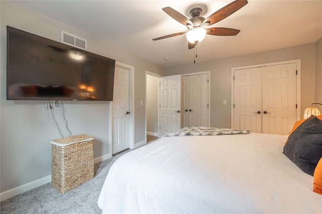 1104 Turkey Run, Rolla, MO 65401 - bedroom with multiple closets, baseboards, carpet, and ceiling fan