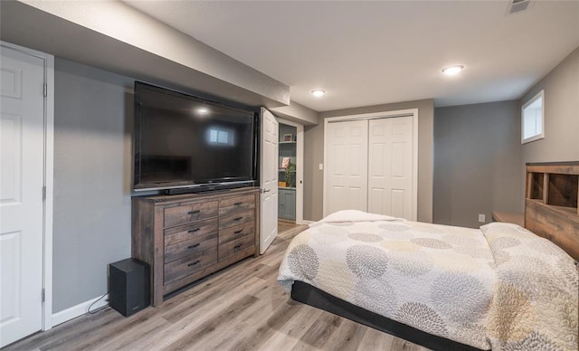 1104 Turkey Run, Rolla, MO 65401 - bedroom with light wood-style floors, a closet, baseboards, and recessed lighting