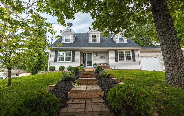 1104 Turkey Run, Rolla, MO 65401 - new england style home with a front lawn, a garage, and roof with shingles