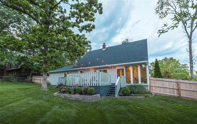 1104 Turkey Run, Rolla, MO 65401 - rear view of property with a chimney, roof with shingles, and a deck