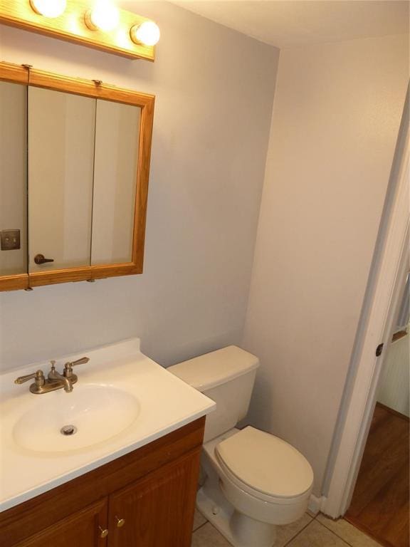 1133 Appleseed Ln Unit B, Saint Louis, MO 63132 - bathroom with vanity, toilet, and tile patterned flooring