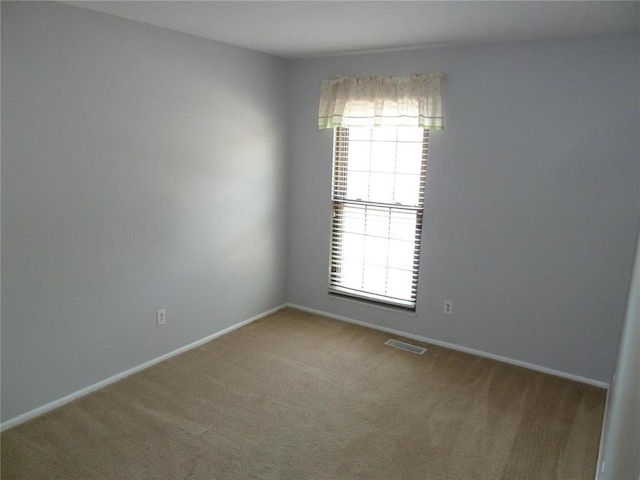1133 Appleseed Ln Unit B, Saint Louis, MO 63132 - carpeted spare room with baseboards