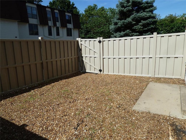 1133 Appleseed Ln Unit B, Saint Louis, MO 63132 - fenced backyard with a gate