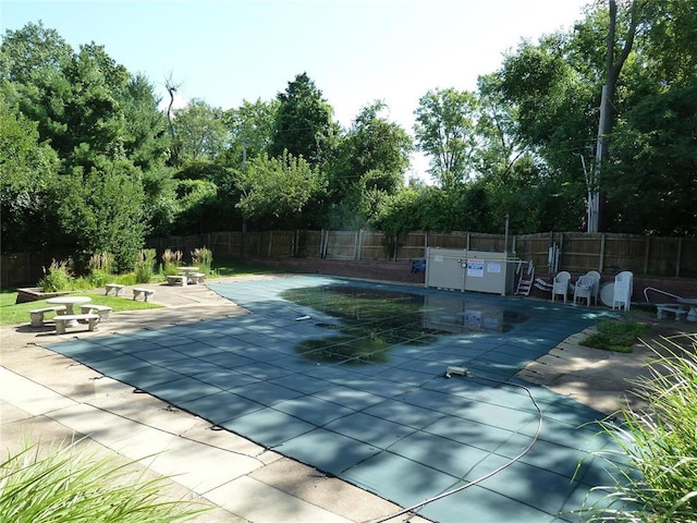 1133 Appleseed Ln Unit B, Saint Louis, MO 63132 - community pool with a fenced backyard and a patio