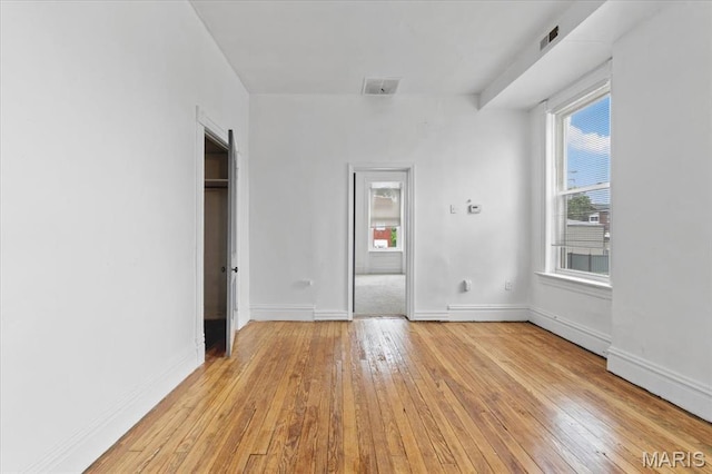 3124 Oregon Ave, Saint Louis, MO 63118 - spare room with light wood-style flooring and baseboards
