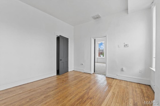 3124 Oregon Ave, Saint Louis, MO 63118 - spare room featuring light wood-style floors and baseboards