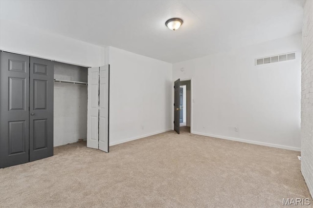 3124 Oregon Ave, Saint Louis, MO 63118 - unfurnished bedroom with carpet floors, a closet, and baseboards