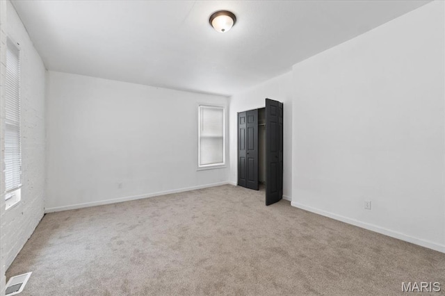 3124 Oregon Ave, Saint Louis, MO 63118 - unfurnished bedroom with carpet and baseboards