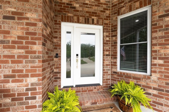 11475 Slate Cir, Rolla, MO 65401 - view of exterior entry featuring brick siding
