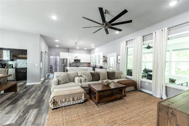 11475 Slate Cir, Rolla, MO 65401 - living room featuring ceiling fan, dark wood-style floors, recessed lighting, and baseboards