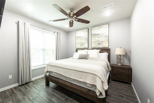 11475 Slate Cir, Rolla, MO 65401 - bedroom featuring baseboards, wood tiled floors, recessed lighting, and ceiling fan