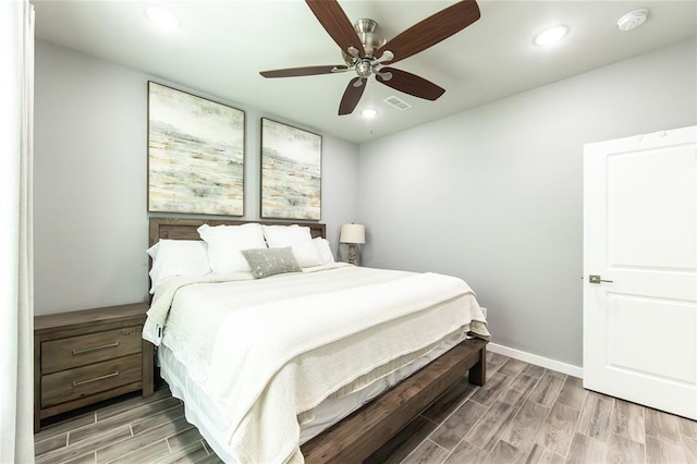 11475 Slate Cir, Rolla, MO 65401 - bedroom with light wood-style floors, recessed lighting, ceiling fan, and baseboards