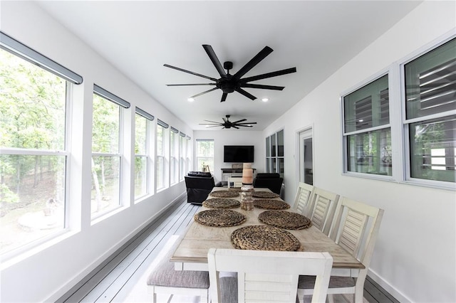 11475 Slate Cir, Rolla, MO 65401 - sunroom / solarium featuring baseboards and recessed lighting