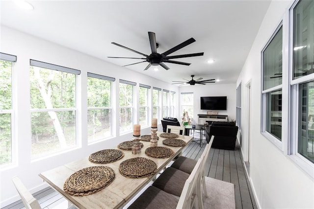 11475 Slate Cir, Rolla, MO 65401 - sunroom with plenty of natural light, recessed lighting, hardwood / wood-style flooring, and baseboards