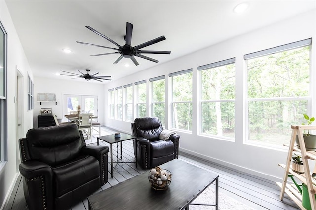 11475 Slate Cir, Rolla, MO 65401 - sunroom / solarium with french doors, recessed lighting, baseboards, and hardwood / wood-style floors