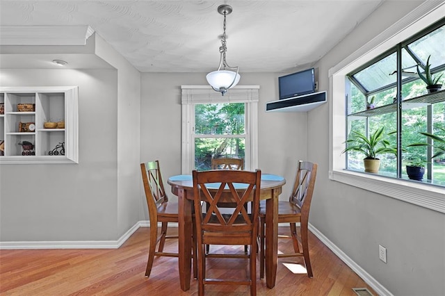 5810 Sorrel Tree Ct, Saint Louis, MO 63129 - dining area with light wood finished floors and baseboards