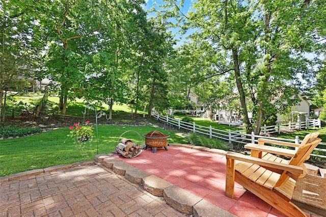 5810 Sorrel Tree Ct, Saint Louis, MO 63129 - view of patio featuring a fire pit