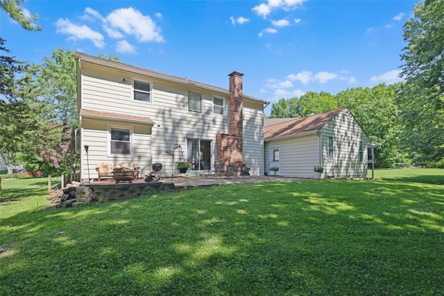 5810 Sorrel Tree Ct, Saint Louis, MO 63129 - back of property featuring a patio area, a chimney, and a yard