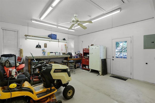 5810 Sorrel Tree Ct, Saint Louis, MO 63129 - garage with electric panel, a ceiling fan, and a workshop area