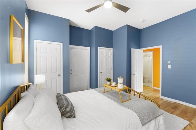 4366 Swan Ave, Saint Louis, MO 63110 - bedroom featuring wood finished floors, baseboards, and a ceiling fan
