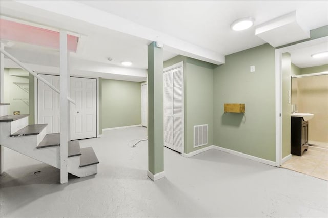 4366 Swan Ave, Saint Louis, MO 63110 - finished basement with baseboards and stairway