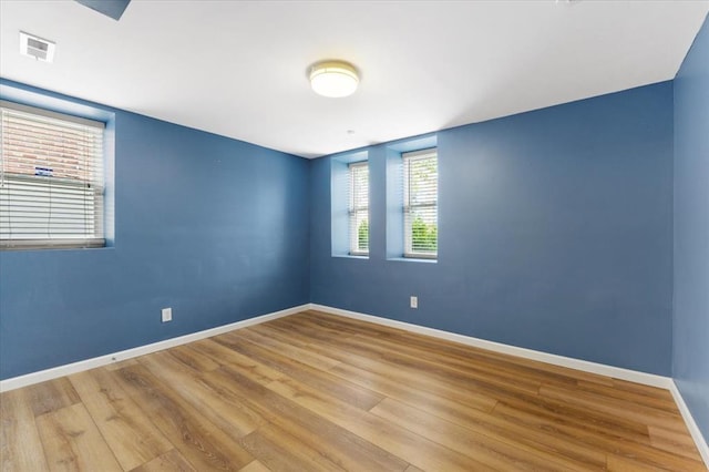 4366 Swan Ave, Saint Louis, MO 63110 - empty room with wood finished floors and baseboards