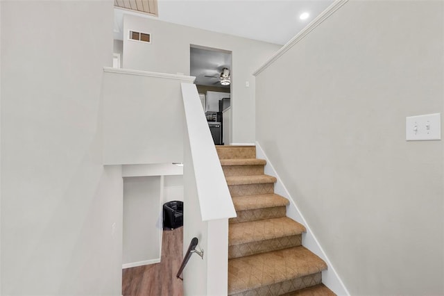 5 Braquewood Ct, Manchester, MO 63021 - stairs with ceiling fan, baseboards, and wood finished floors