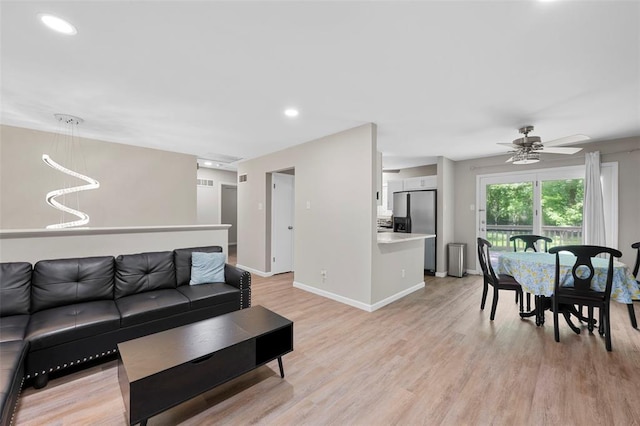 5 Braquewood Ct, Manchester, MO 63021 - living room with ceiling fan, light wood-style flooring, baseboards, and recessed lighting