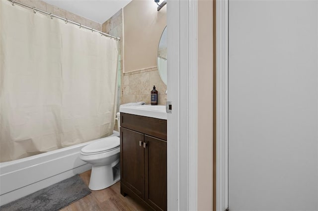 5 Braquewood Ct, Manchester, MO 63021 - full bath with vanity, tile walls, toilet, shower / tub combo with curtain, and wood finished floors