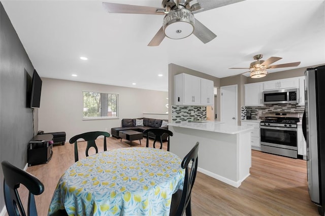 5 Braquewood Ct, Manchester, MO 63021 - dining room with a ceiling fan, light wood-style floors, and recessed lighting