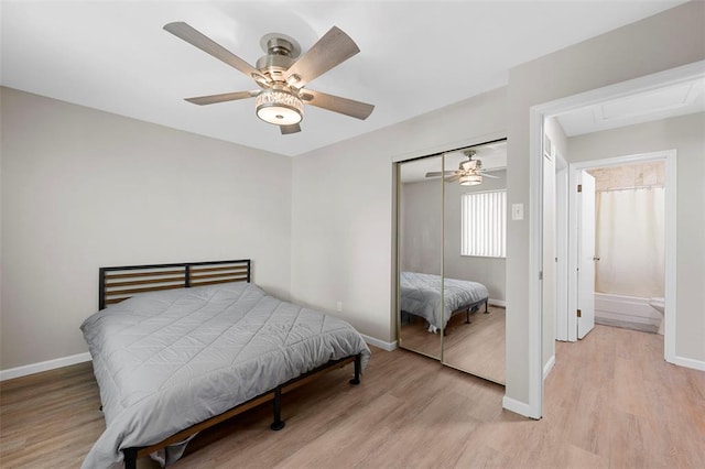 5 Braquewood Ct, Manchester, MO 63021 - bedroom featuring light wood-style floors, a closet, baseboards, and ceiling fan