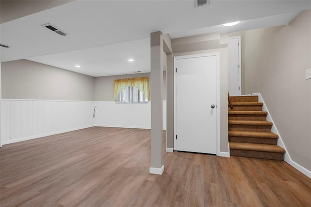 5 Braquewood Ct, Manchester, MO 63021 - below grade area with wood finished floors, stairs, and recessed lighting