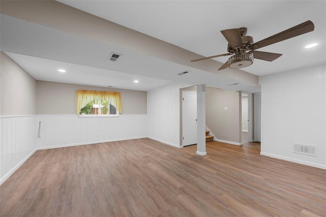 5 Braquewood Ct, Manchester, MO 63021 - spare room with wood finished floors, a ceiling fan, stairway, baseboards, and recessed lighting
