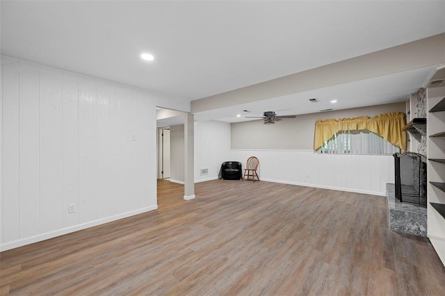 5 Braquewood Ct, Manchester, MO 63021 - below grade area with light wood-style flooring, ceiling fan, a decorative wall, and recessed lighting