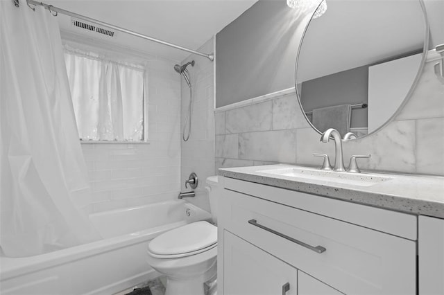 5 Braquewood Ct, Manchester, MO 63021 - bathroom with shower / tub combo, vanity, toilet, and tile walls