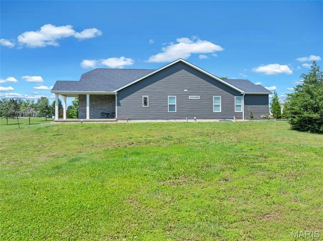 125 Foxwoods Ct, Troy, MO 63379 - view of home's exterior featuring a lawn