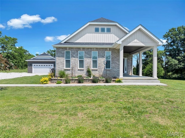 125 Foxwoods Ct, Troy, MO 63379 - craftsman inspired home featuring a front yard, a detached garage, and covered porch