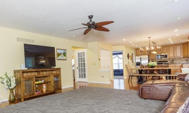 3226 Bridgeport Place Dr, Bridgeton, MO 63044 - living area featuring a ceiling fan, baseboards, recessed lighting, and a chandelier