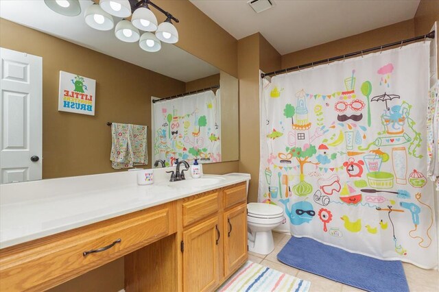 3226 Bridgeport Place Dr, Bridgeton, MO 63044 - bathroom with toilet, vanity, tile patterned flooring, and a shower with shower curtain