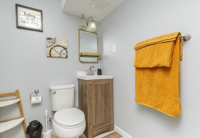 3226 Bridgeport Place Dr, Bridgeton, MO 63044 - bathroom with vanity, toilet, and baseboards
