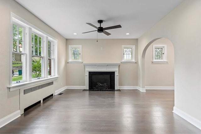 426 Pasadena Ave, Webster Groves, MO 63119 - unfurnished living room featuring radiator, a ceiling fan, dark wood-style flooring, baseboards, and recessed lighting