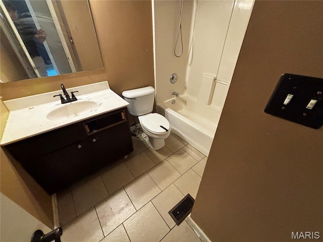 7764 Locust Dr, Barnhart, MO 63012 - full bath featuring vanity, toilet, tile patterned flooring, and washtub / shower combination